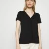 TOM TAILOR V NECK - Basic T-shirt - Deep Black 1 TOM TAILOR V NECK - Basic T-shirt - Deep Black -TOM TAILOR online store 74fcd418437642afb8fcd4d6f3fcb39c